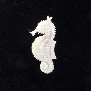 Vintage carved mother of pearl seahorse pin, white, 1.75" length